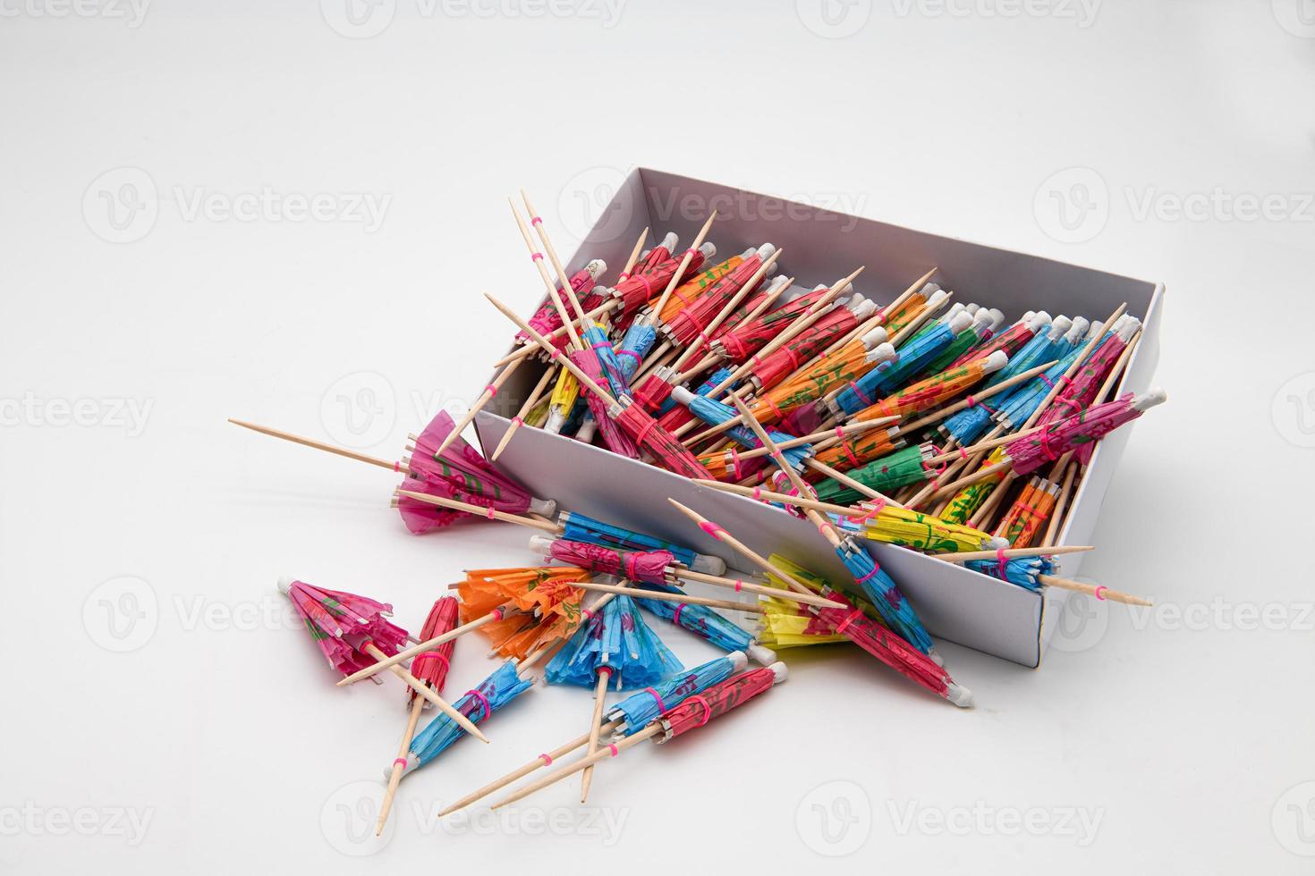 Open box of umbrella cocktail sticks 15130982 Stock Photo at Vecteezy