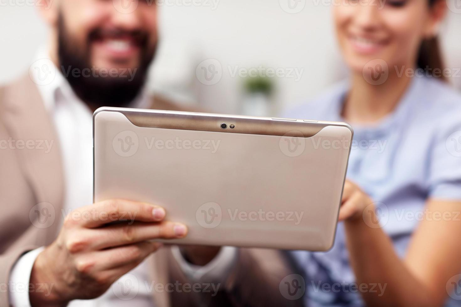 Businesspeople working together in office photo
