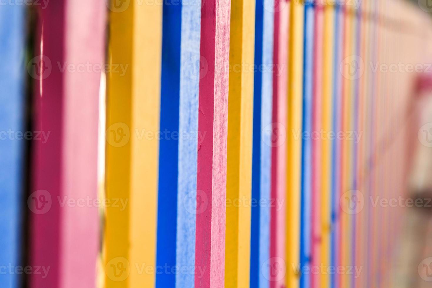 School fence made of plaswood with a steel structure in the background was created to be beautiful in a variety of colors in the imagination of children. It is a kind of work of art. photo