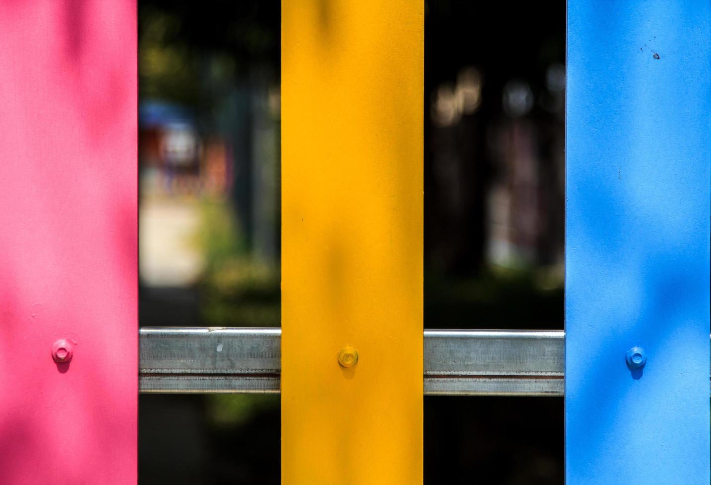 School fence made of plaswood with a steel structure in the background was created to be beautiful in a variety of colors in the imagination of children. It is a kind of work of art. photo