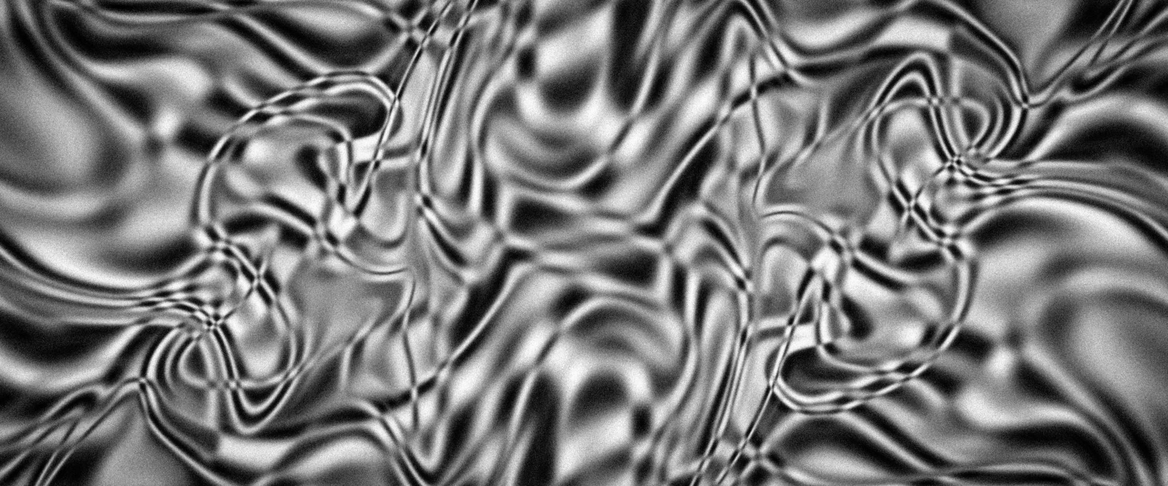 Abstract flowing liquid curve line in grey silver black metallic. Glossy pattern cool background textures. Beautiful drawing with the divorces and wavy lines in gray tones. Beautiful Marbling. Marble photo