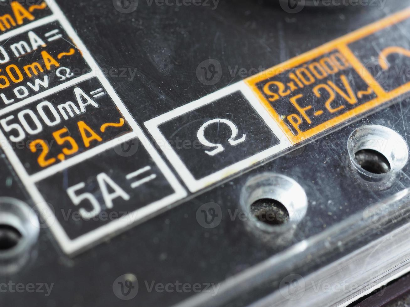 electrical symbol on vintage analog multimeter photo