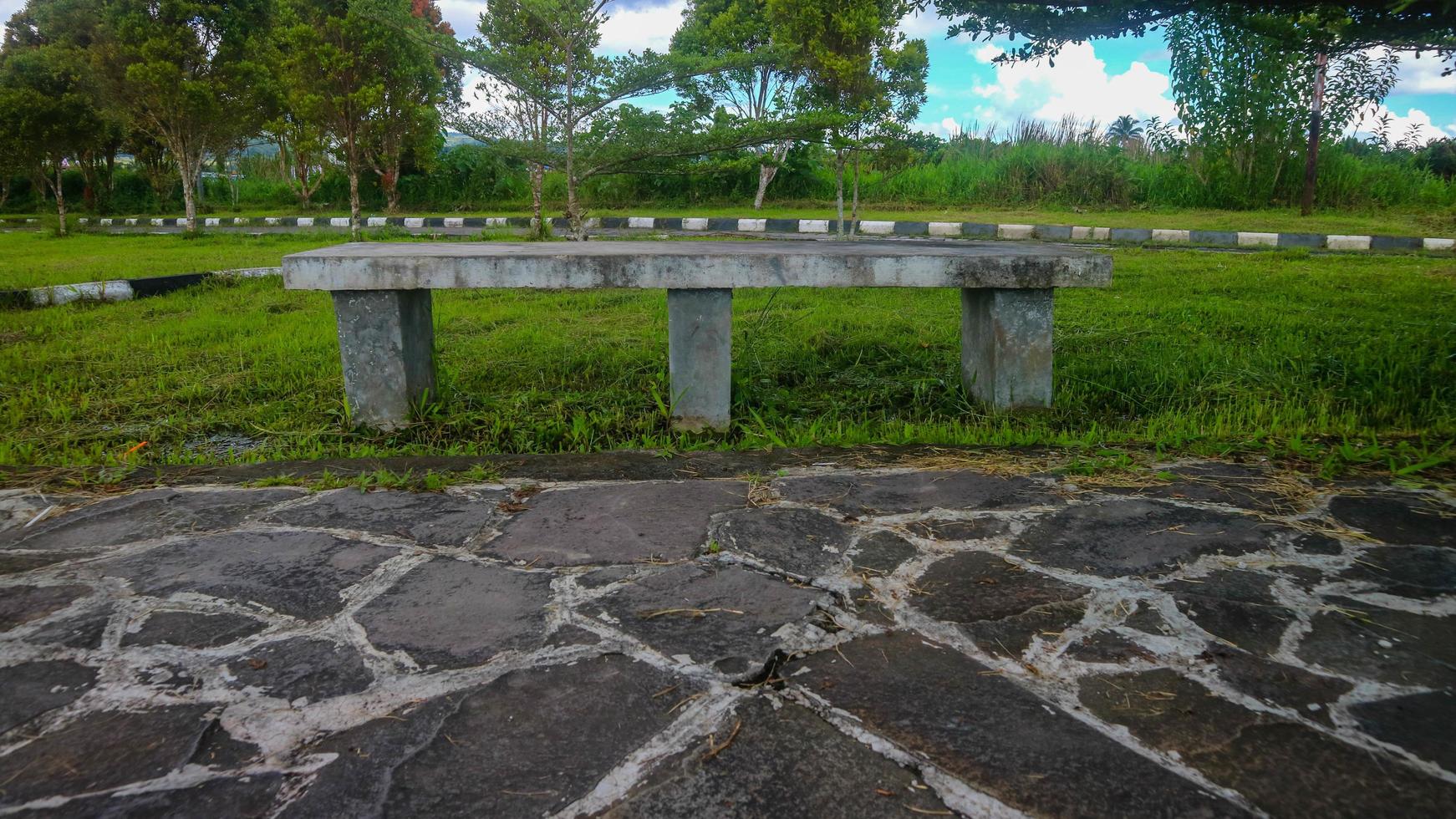 concrete seating in a lovely garden photo