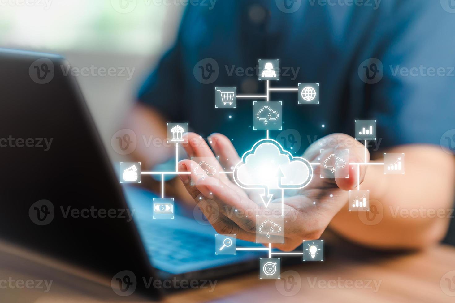 Businessman working at cloud data icon, cloud computing diagram show on hand. Cloud technology. Data storage. Networking and internet service concept. photo
