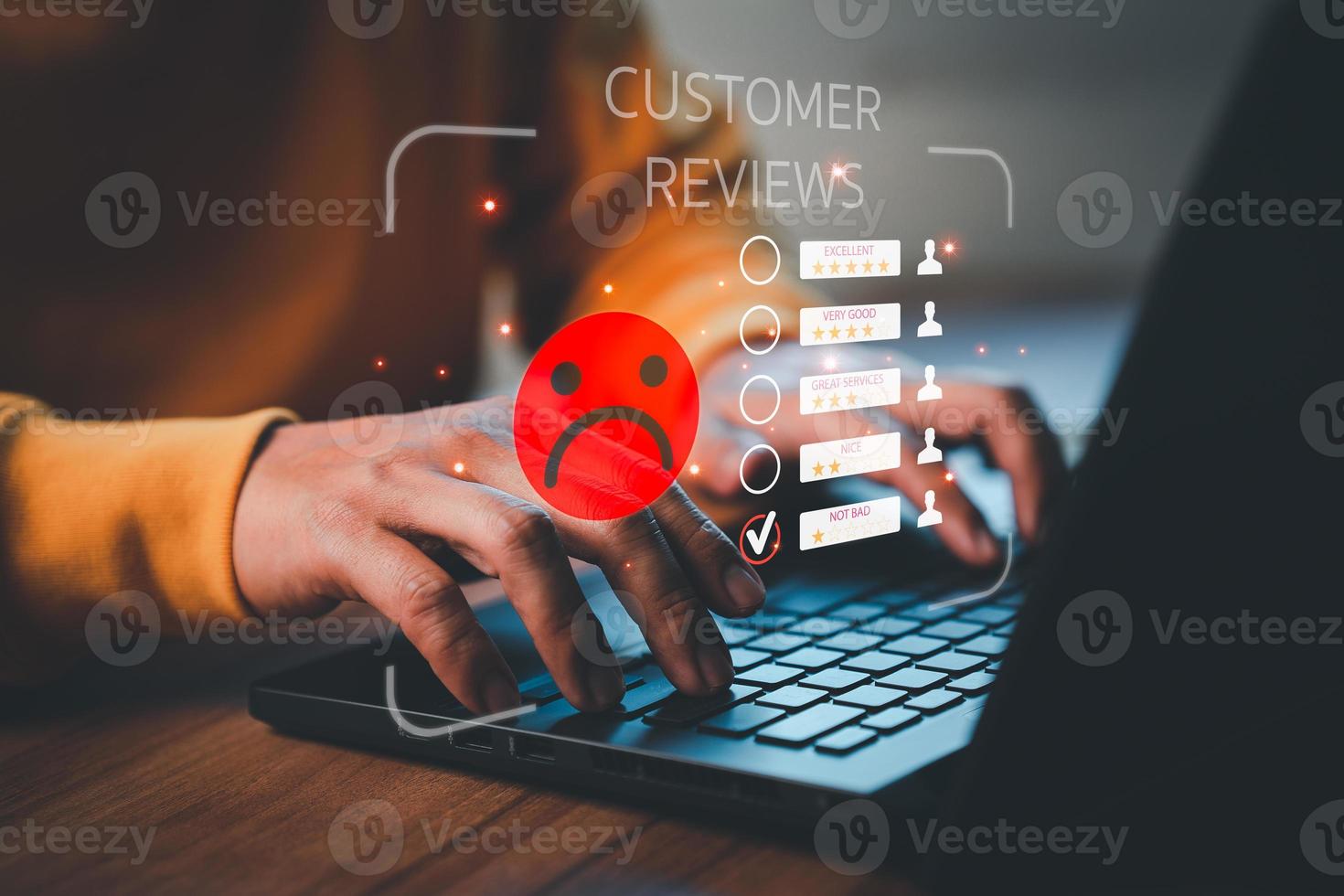 Unhappy man customer with sad emotion face on laptop. Bad review and service dislike poor quality, low rating, bad social media not good. Customer experience dissatisfied and testimonial concept. photo