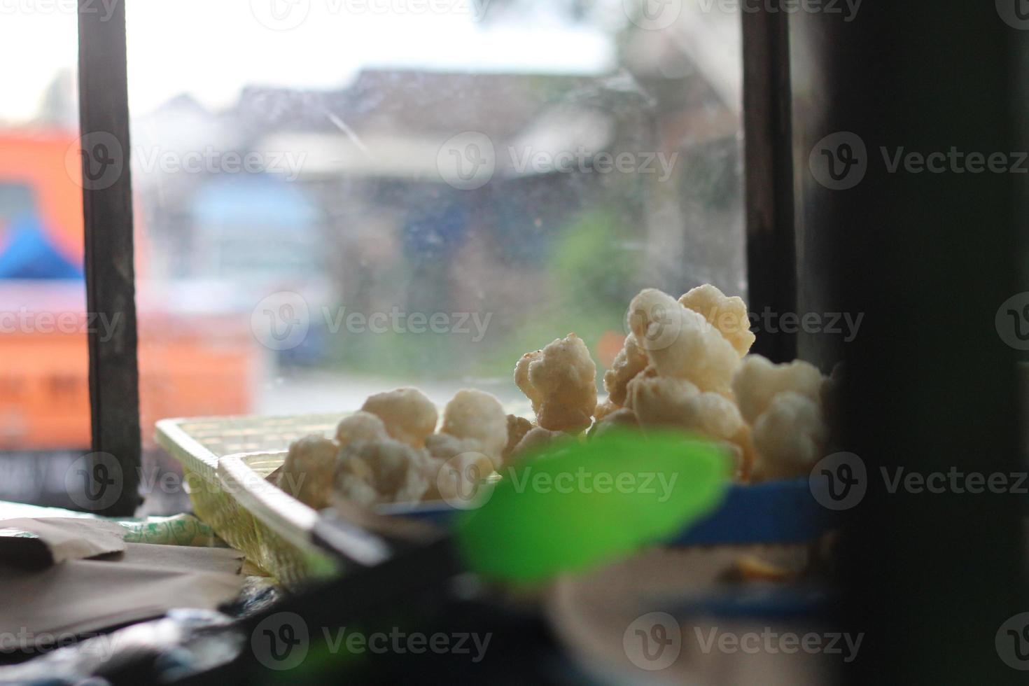 Geblek or cenolan is a traditional food from salaman, Magelang, made from tapioca flour and seasoned with savory fried onions. photo