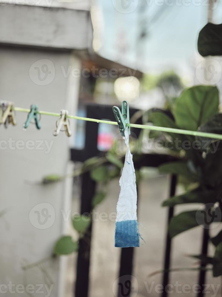 Testing dying indigo cotton . Concept workshop photo