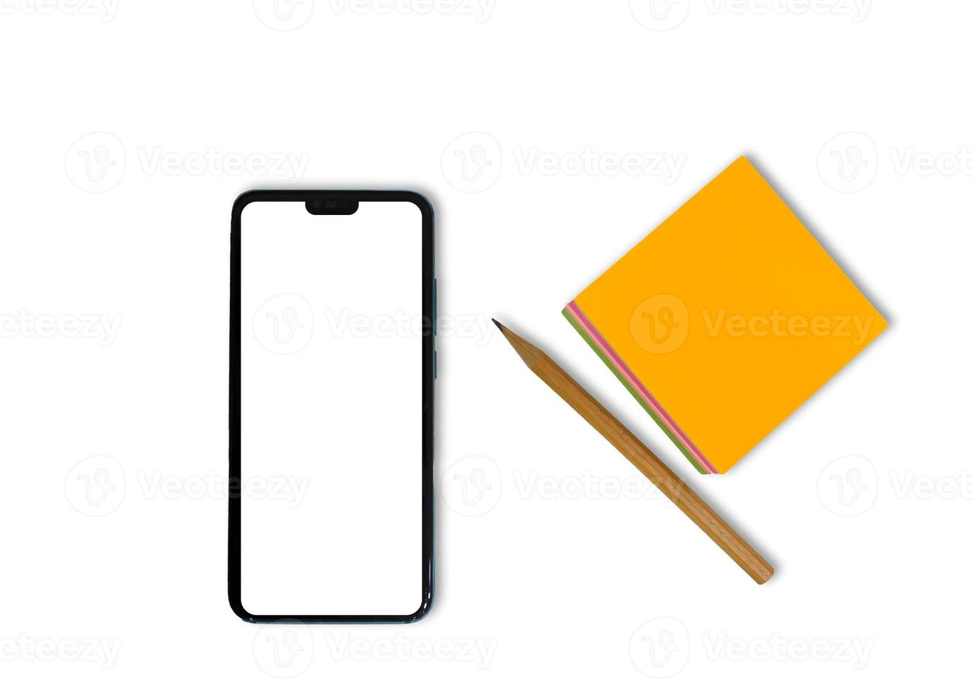 Mockup, smartphone. Smartphone, pencil and paper notepad on a white background. photo