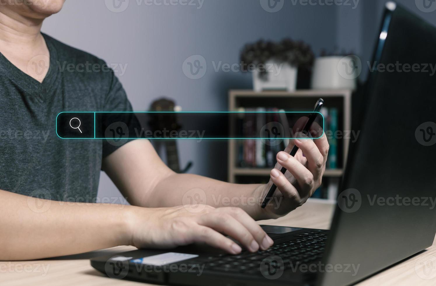 Searching Browsing Internet Data Information with blank search bar.handof businessman working with computer laptop on desk in office.SearchEngine Optimization SEO Networking Concept. photo