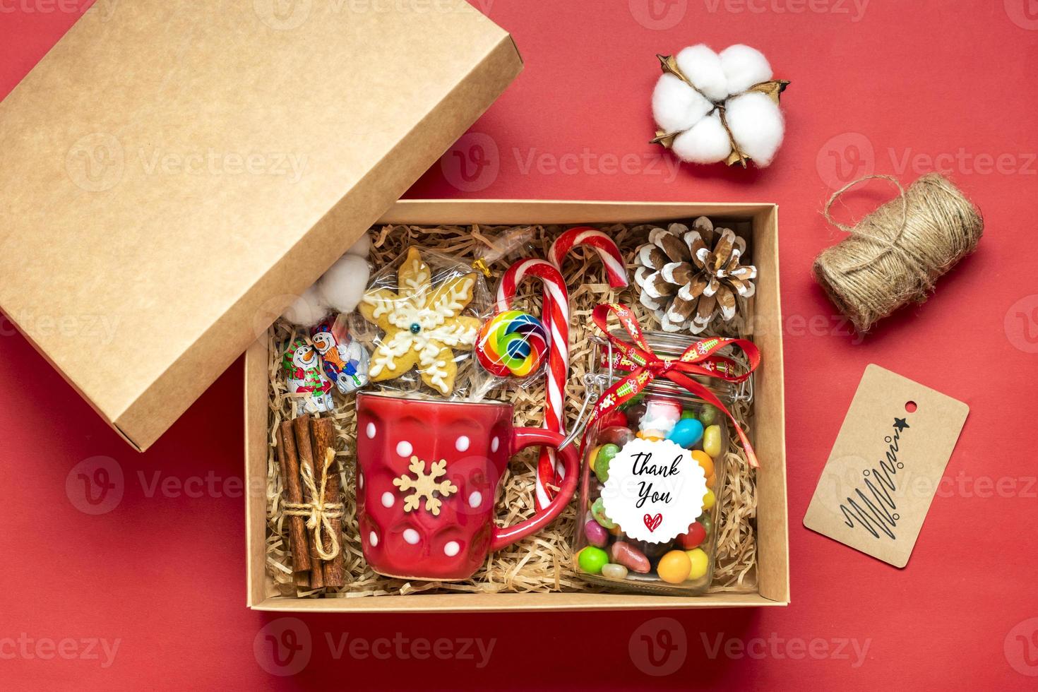 Handmade care package, seasonal gift box with candies, gingerbread, xmas decor Personalized eco friendly basket for family, friends, girl for thanksgiving, Christmas, mothers, fathers day Flat lay photo