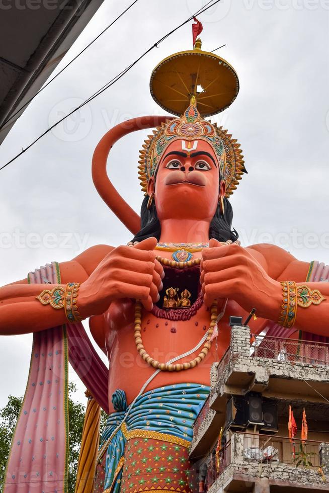 Big statue of Lord Hanuman near the delhi metro bridge situated near Karol Bagh, Delhi, India, Lord Hanuman big statue touching sky photo