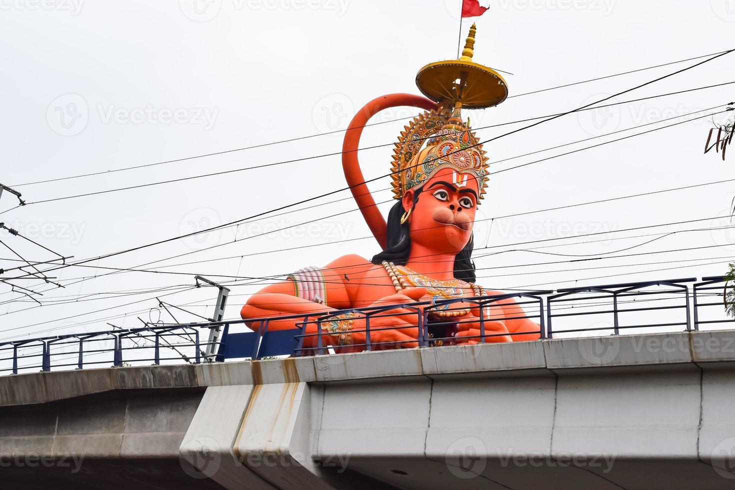 Big statue of Lord Hanuman near the delhi metro bridge situated near Karol Bagh, Delhi, India, Lord Hanuman big statue touching sky photo