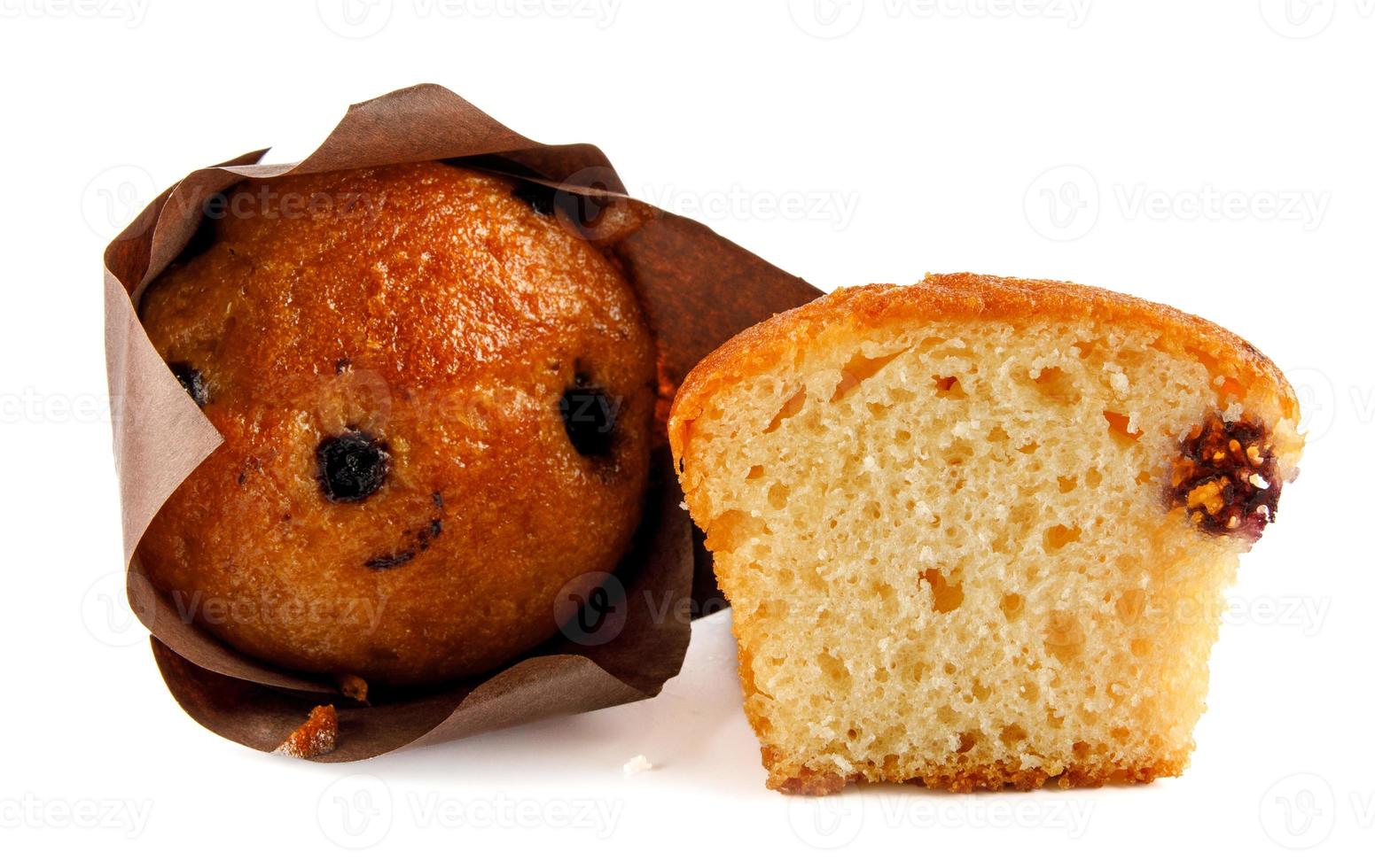 Whole and half muffin isolated on white background. Full clipping path. photo