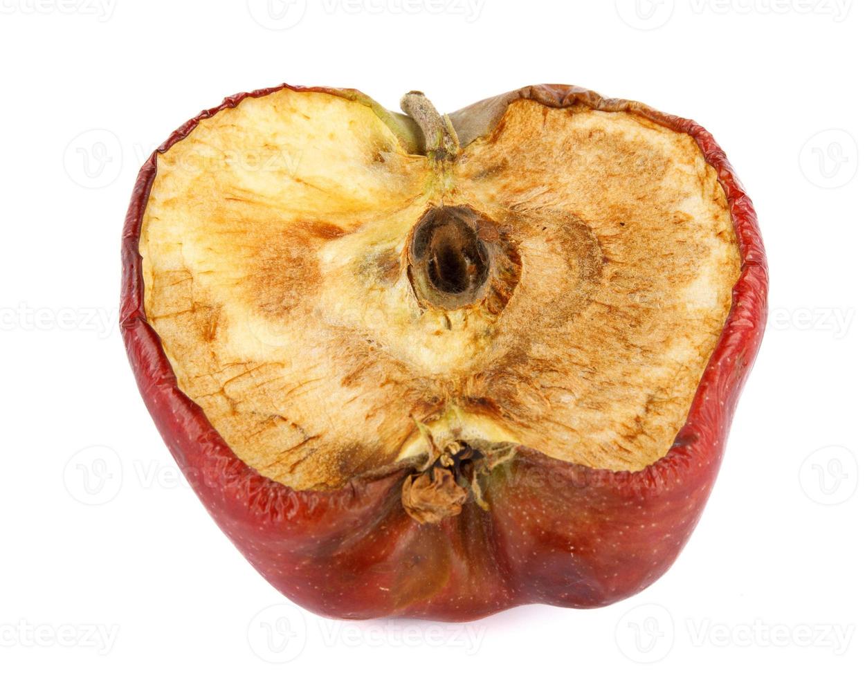 Half of the rotten apple is isolated on a white background. Full clipping path. photo