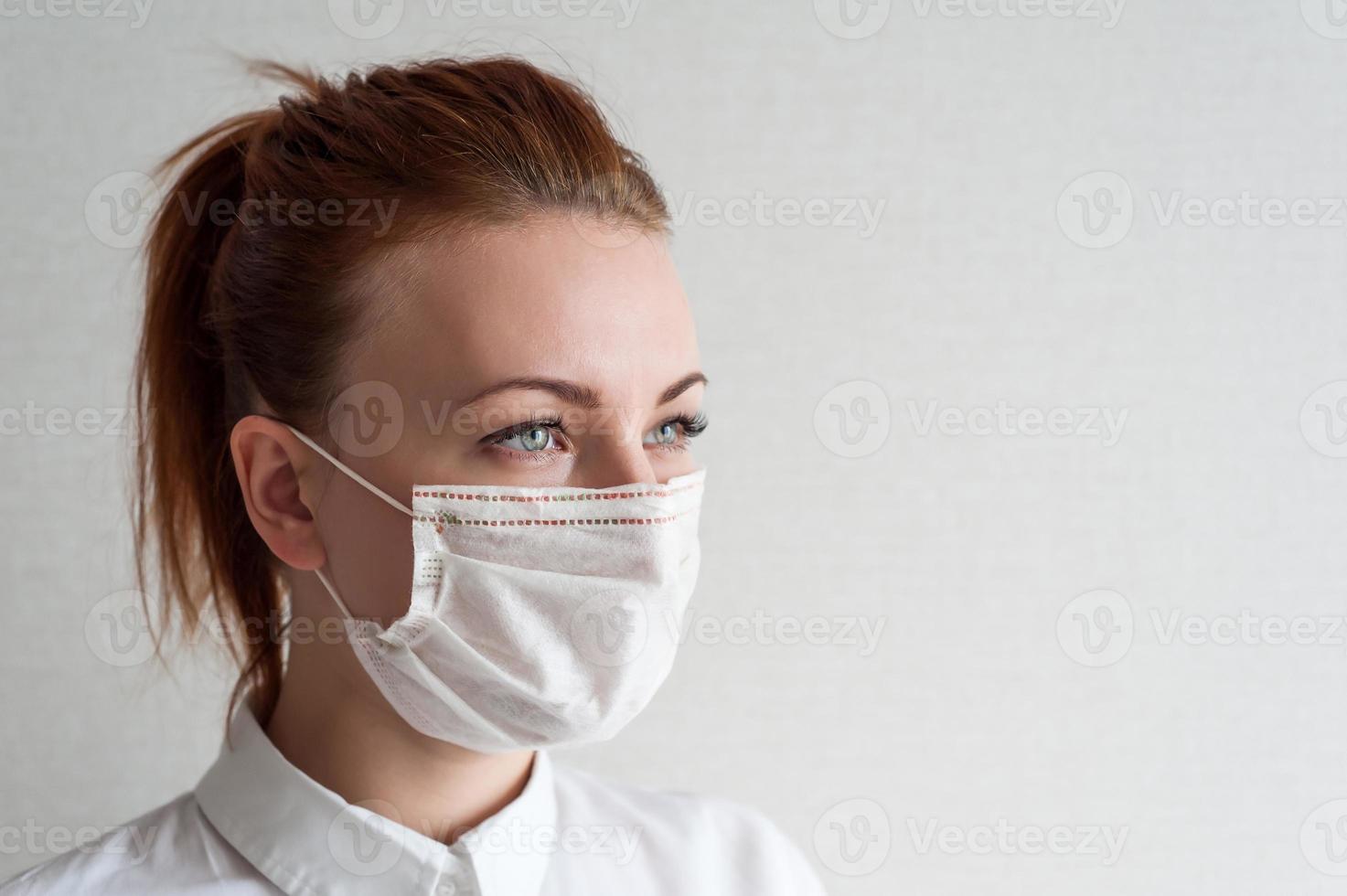 Portrait of a girl in a medical mask. Close up photo