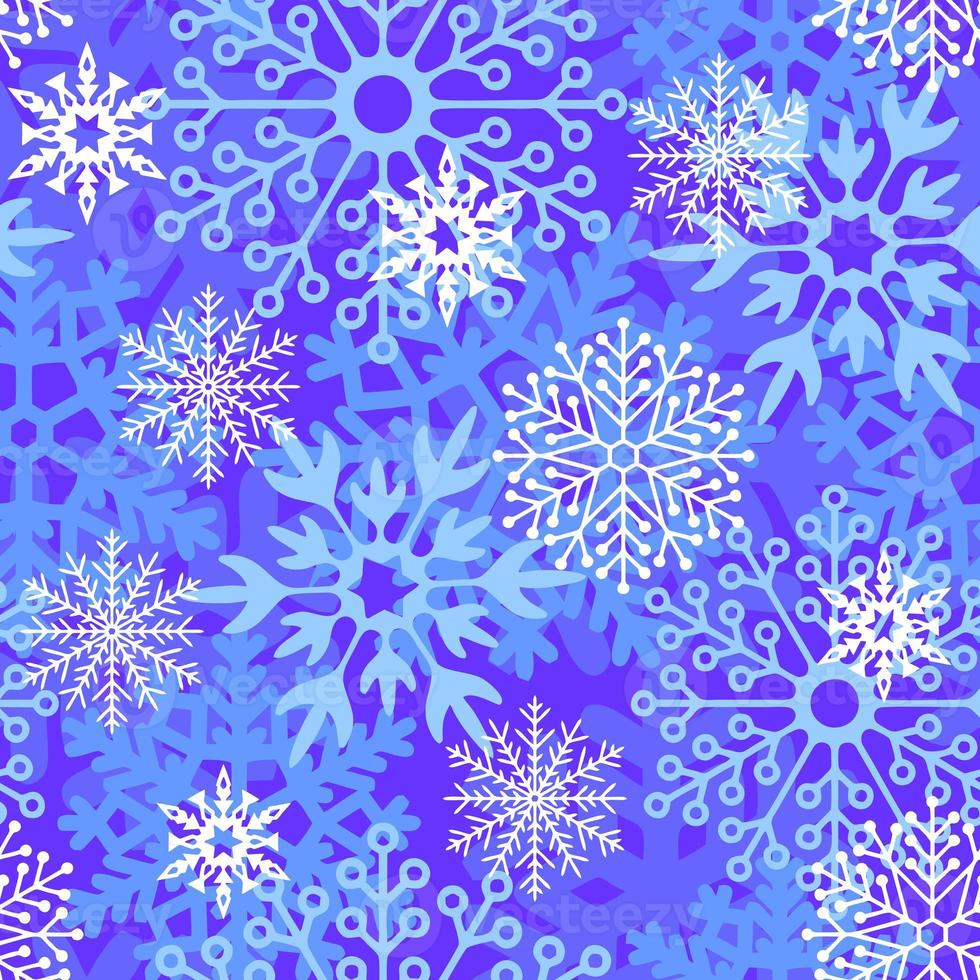 seamless asymmetric pattern of multicolored snowflakes on a blue background, texture, design photo