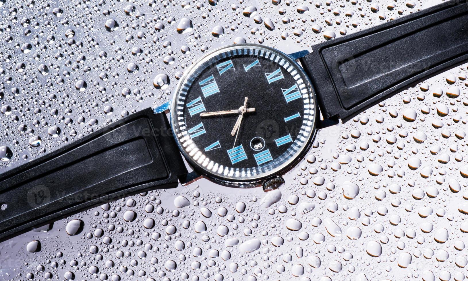 relojes de hombre vidrio mojado negro foto