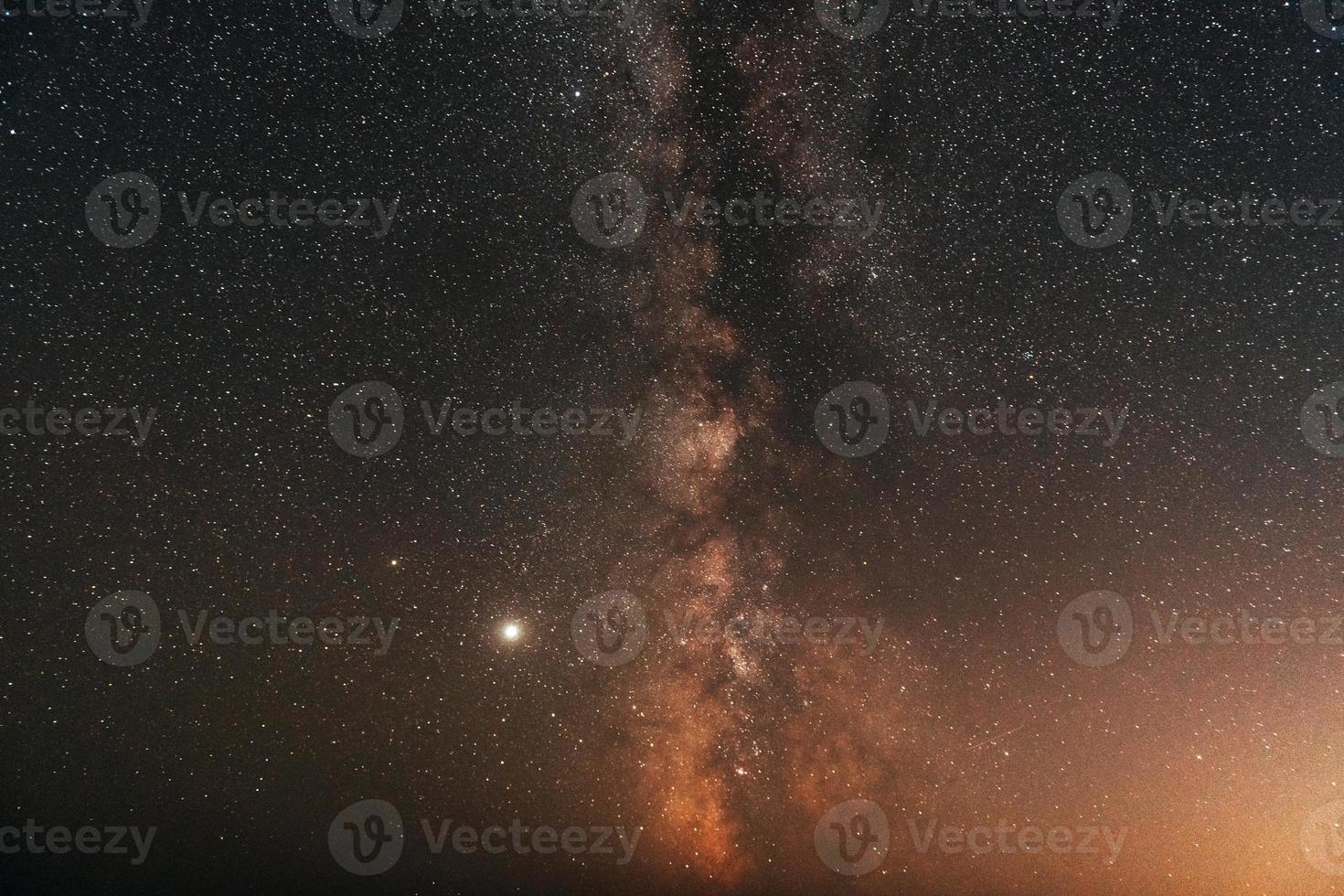 Fantastic view of night starry sky with mily way galaxy. Conception of space photo