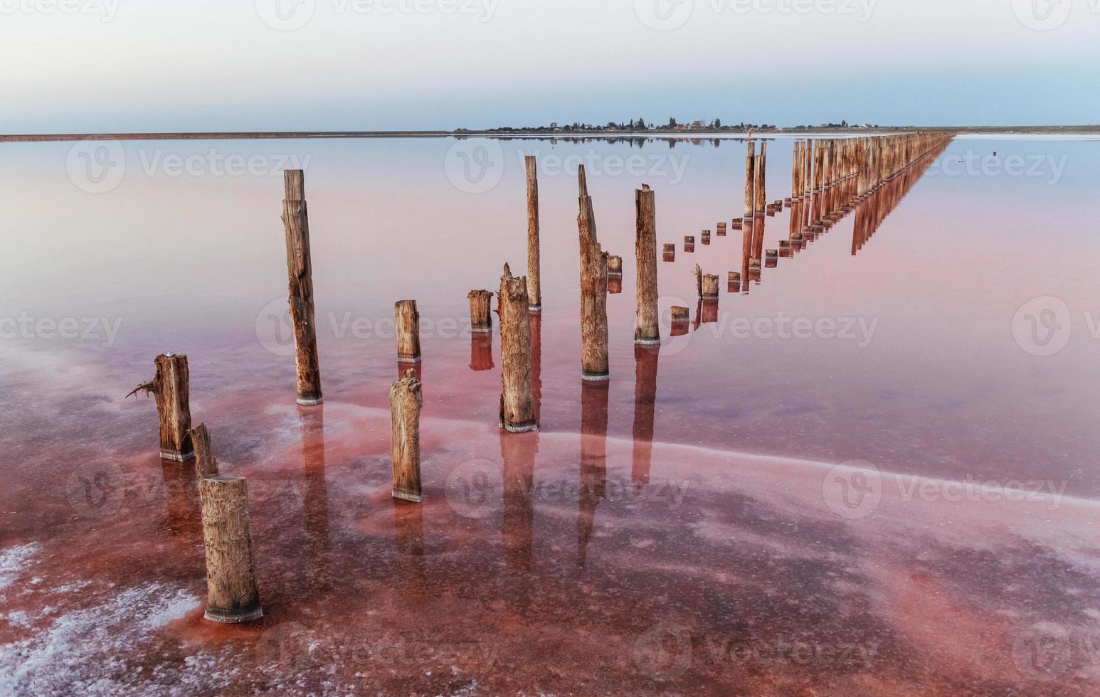 Wooden obstacles in the sea of Jarilgach island, Ukraine. At daytime photo