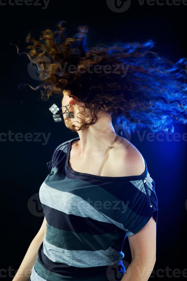 young woman dancing photo