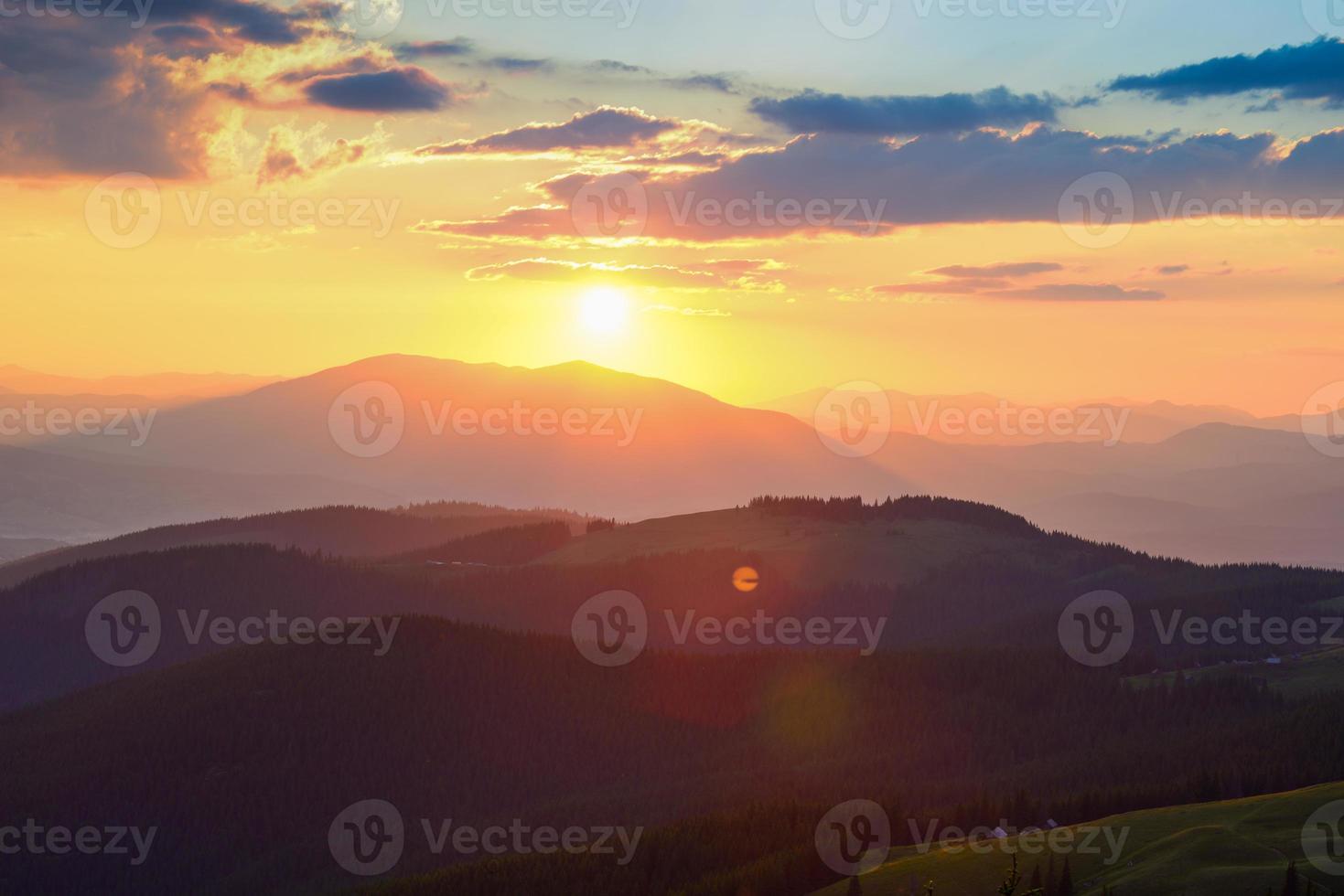 sunset in mountains photo