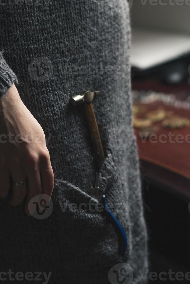 Close up jewelry instruments in pocket concept photo