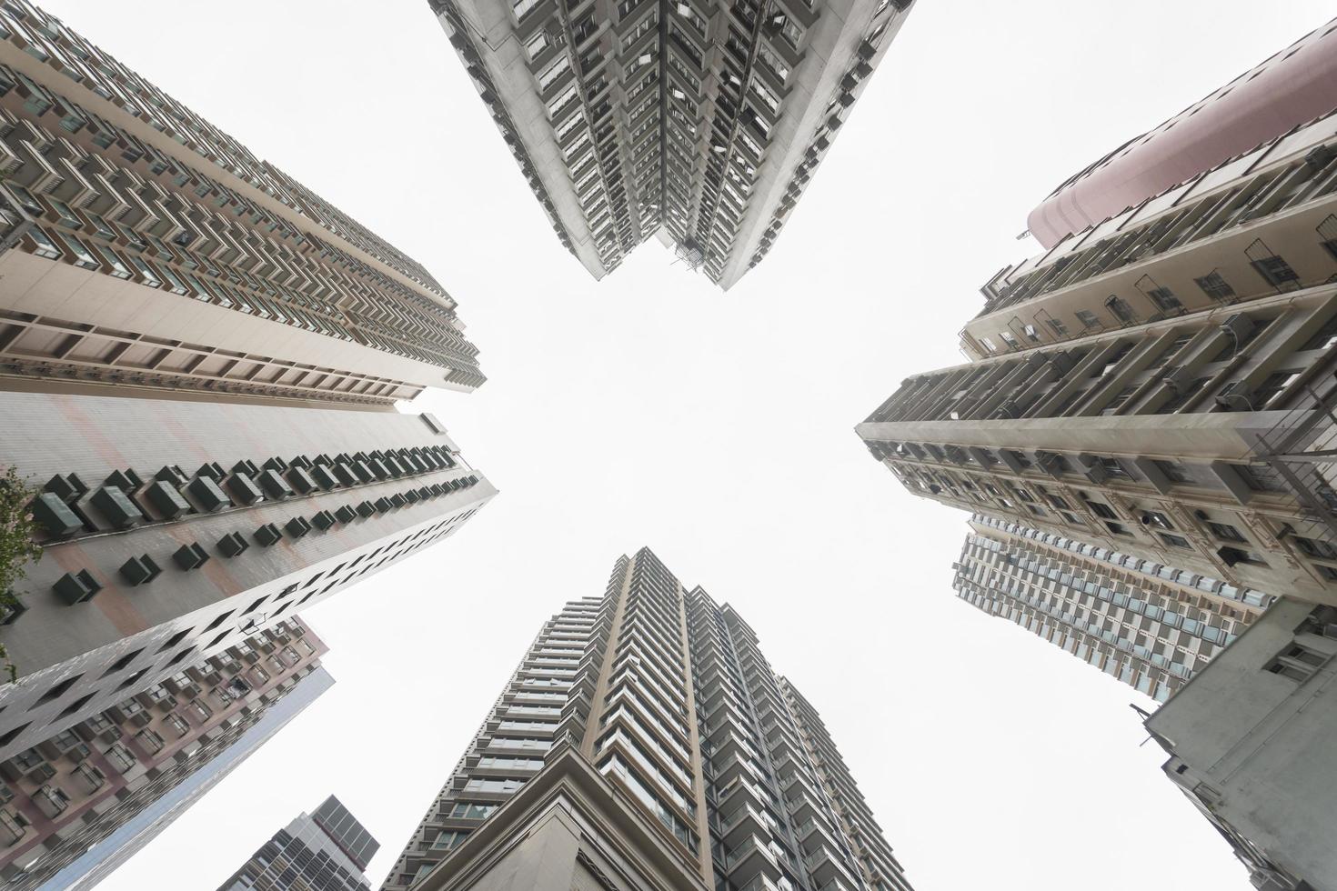 Low angle shot of a residential building, a commercial building. photo