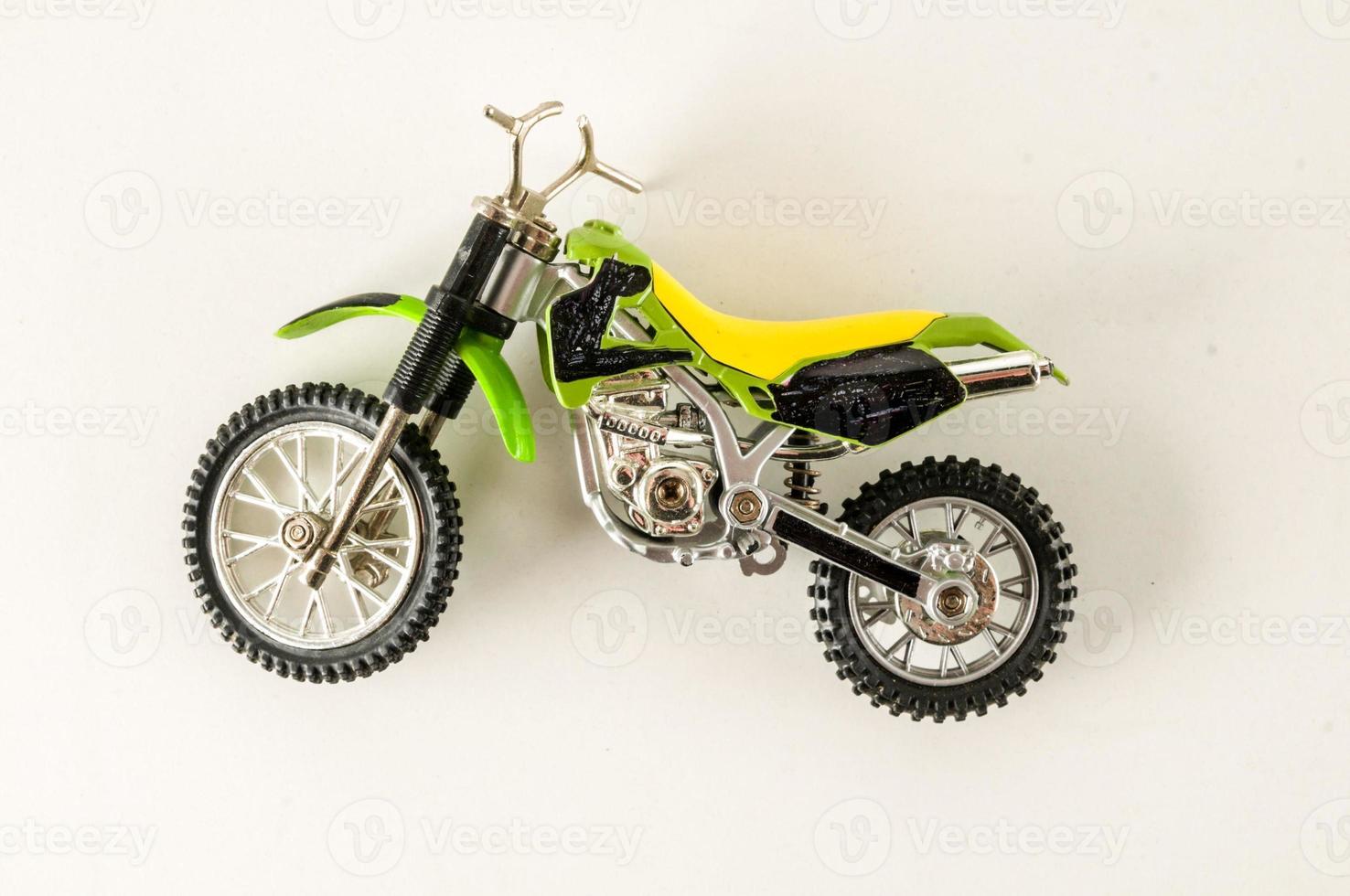 Motorcycle miniature on white background photo