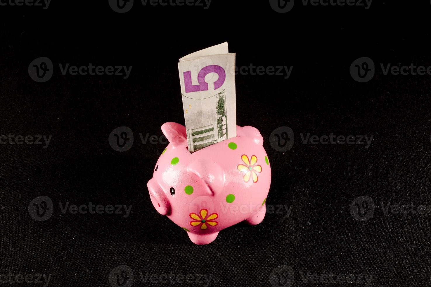 Piggy bank with money photo
