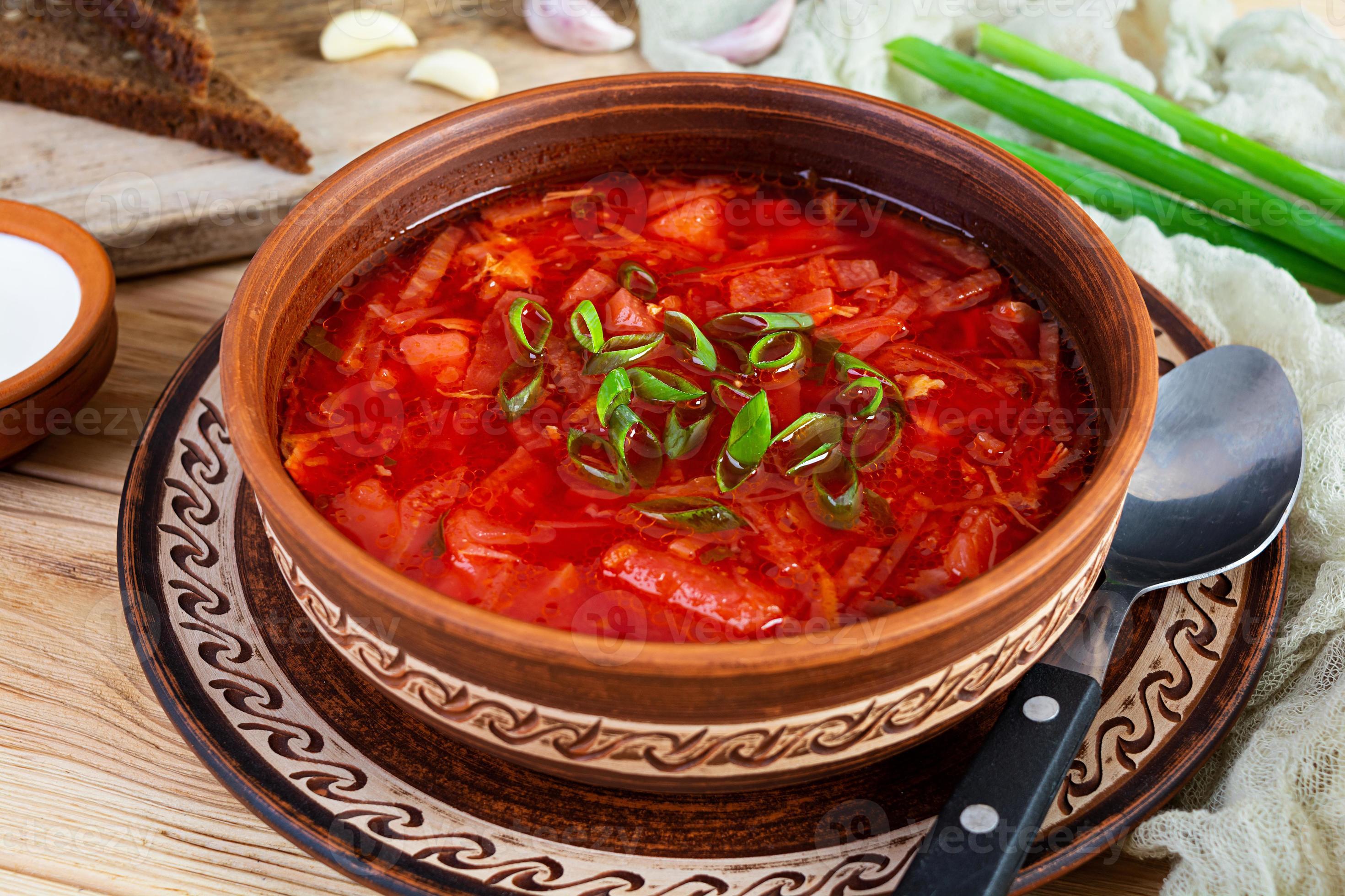 Traditional ukrainian borscht with green onion and sour cream Traditional ukrainian borscht with green onion and sour cream