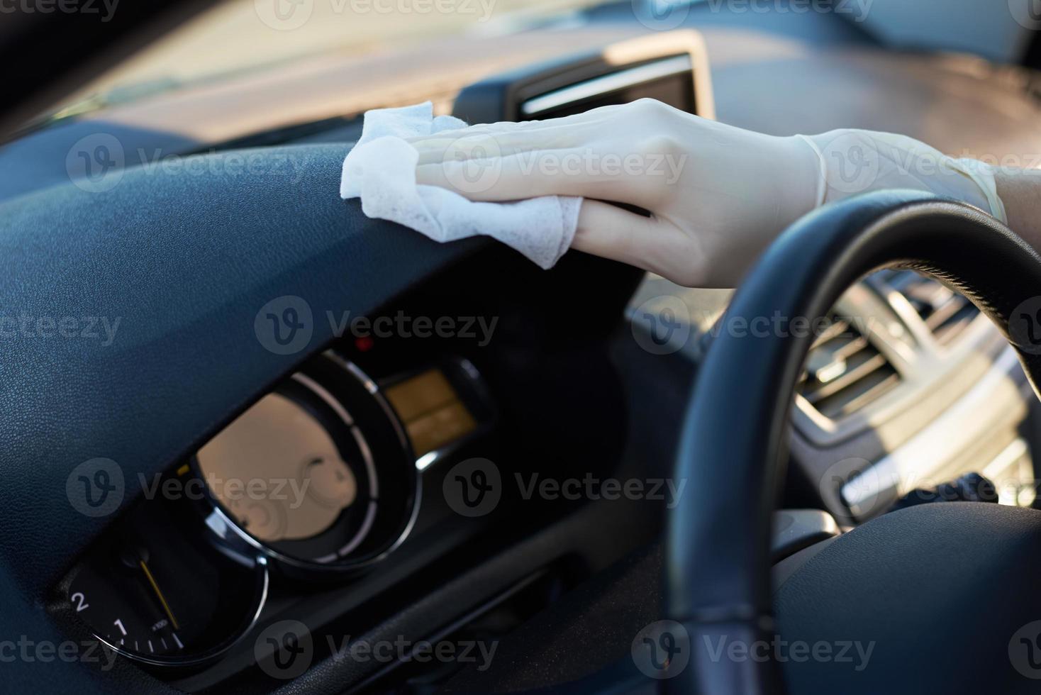 Woman cleaning car dashboard with a disinfection spray 15178357 Stock Photo at Vecteezy