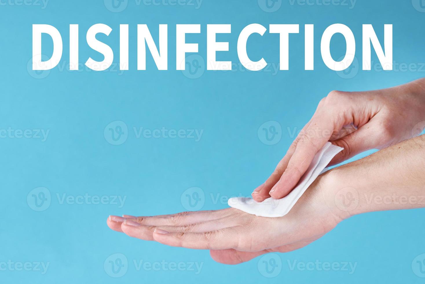 Woman wash hands using antibacterial napkin photo