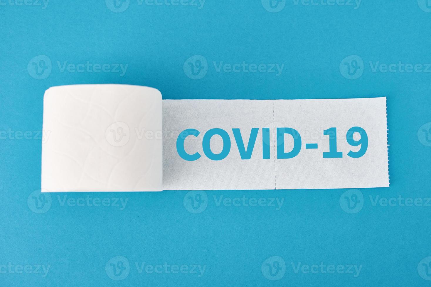 Toilet paper rolls on a blue background. Hygiene concept photo
