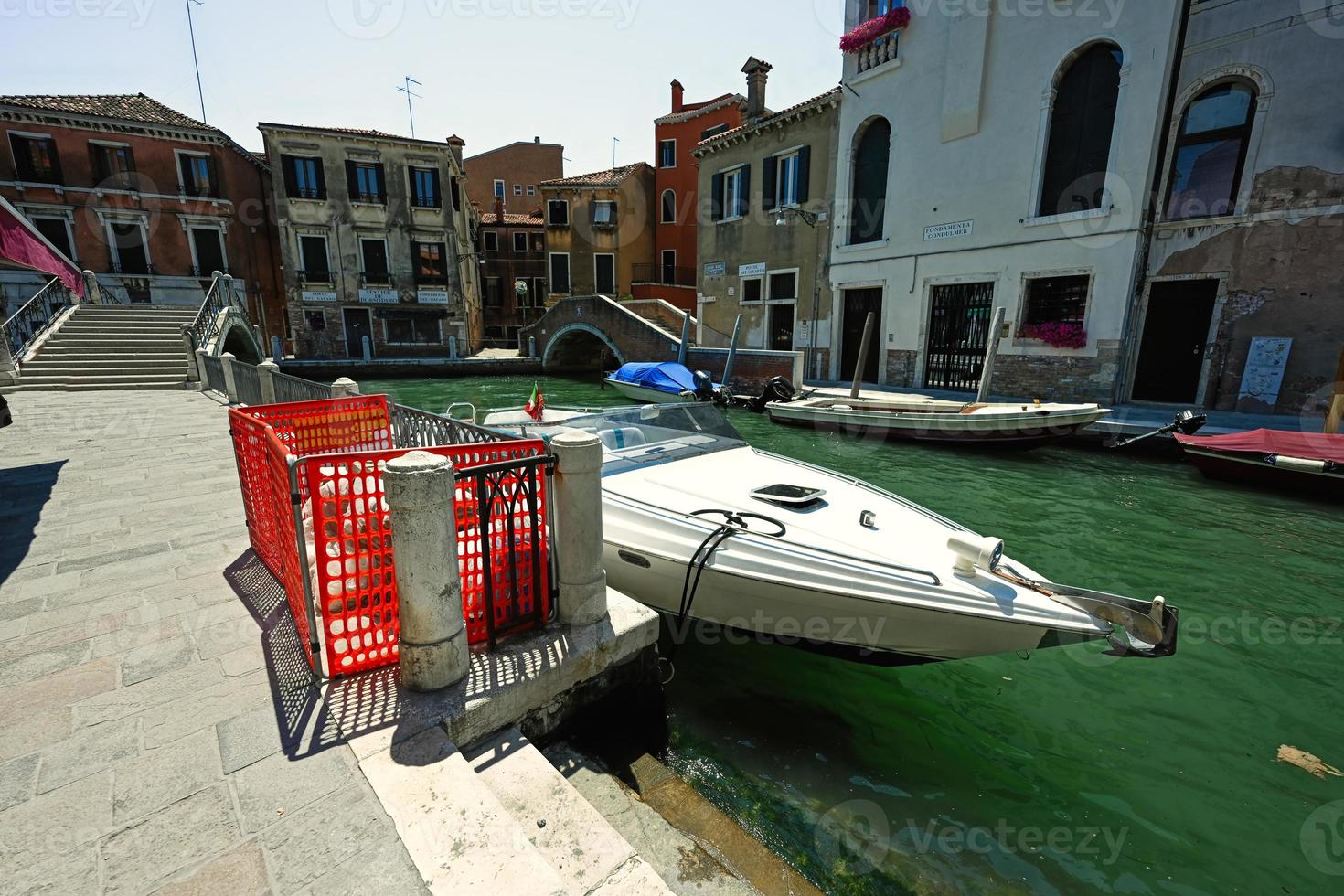 Canal with boats in Venice, Italy. Fondamenta Condulmer street. photo