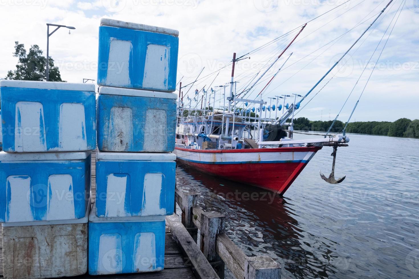 Cork box for fish caught by fishermen to keep fish fresh by adding ice photo
