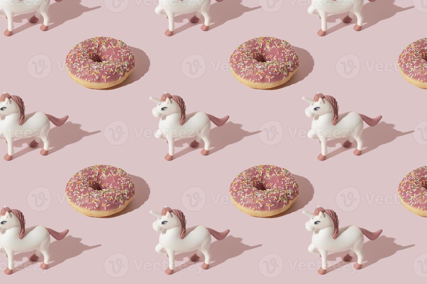 Simple and cute doughnut unicorn patern. Pastel pink color. photo