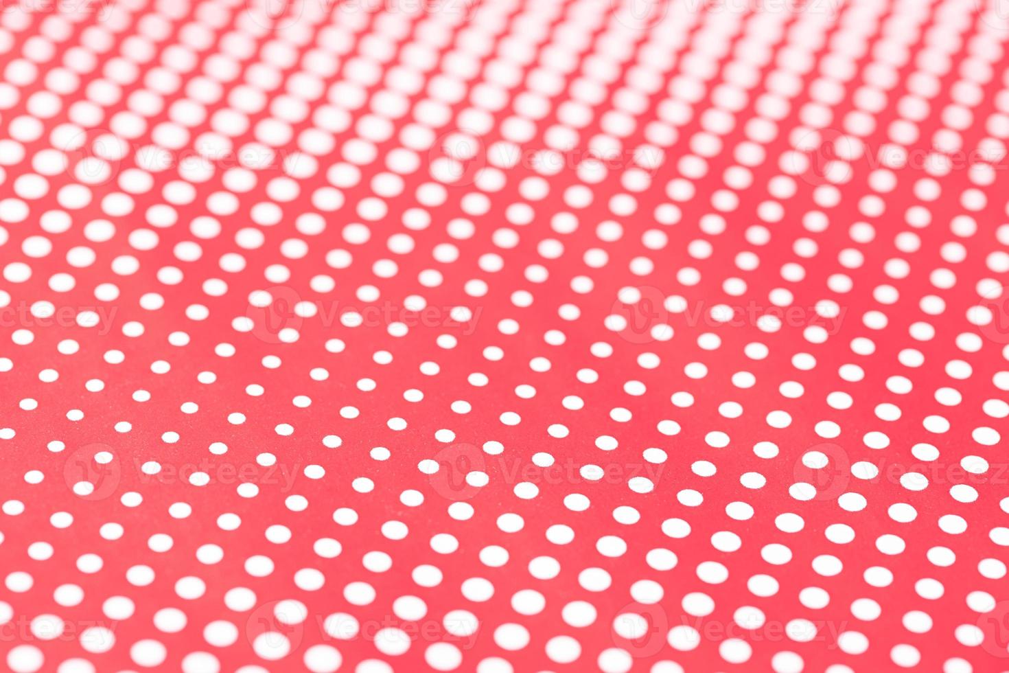 Red and white abstract background. Halftone pattern paper design. Selective focus photo