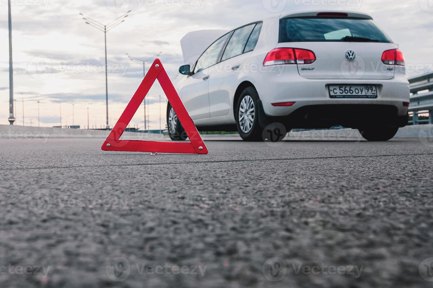 Car emergency or breakdown on highway road, waiting for roadside assistance photo