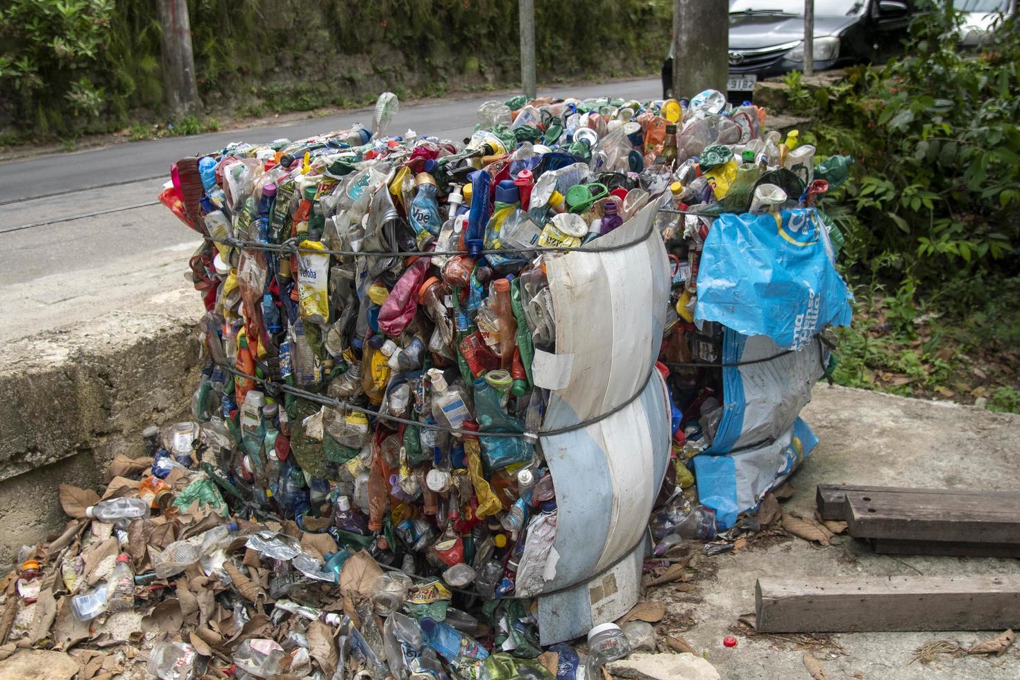 Rio, Brazil - november 26, 2022, recyclable garbage pressing into big bales photo