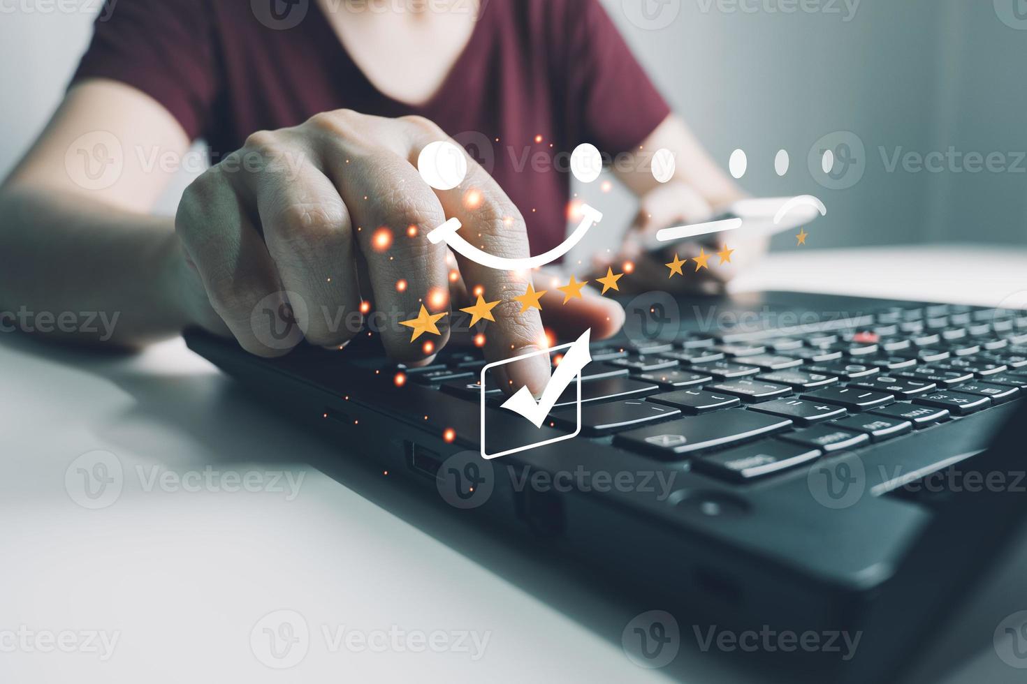 Concept of customer satisfaction and service, businesswoman using laptop to express their opinions, answers and satisfied scores. photo