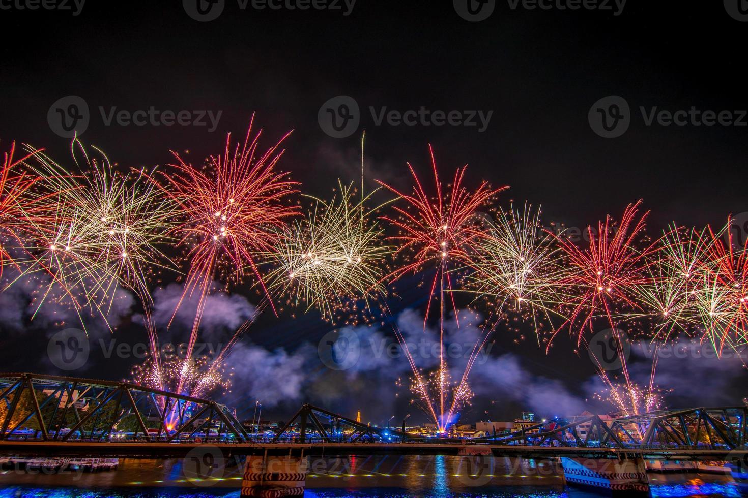 fireworks from Vijit Chao Phraya on Buddhayodfa Chulalok Maharat Bridge, Bangkok, Thailand. photo