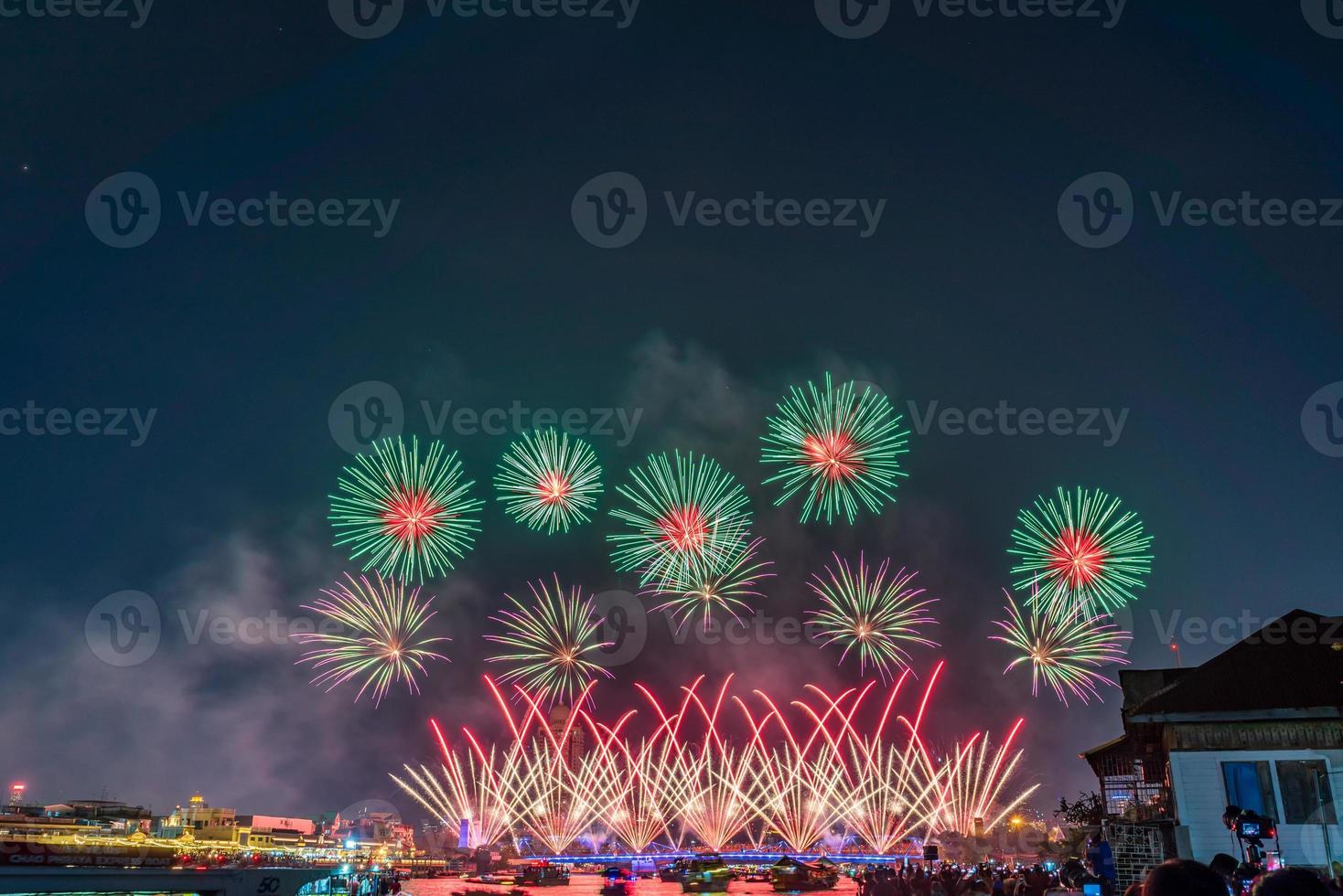 Colorful fireworks from Vijit Chao Phraya on Buddhayodfa Chulalok Maharat Bridge, Bangkok, Thailand. photo