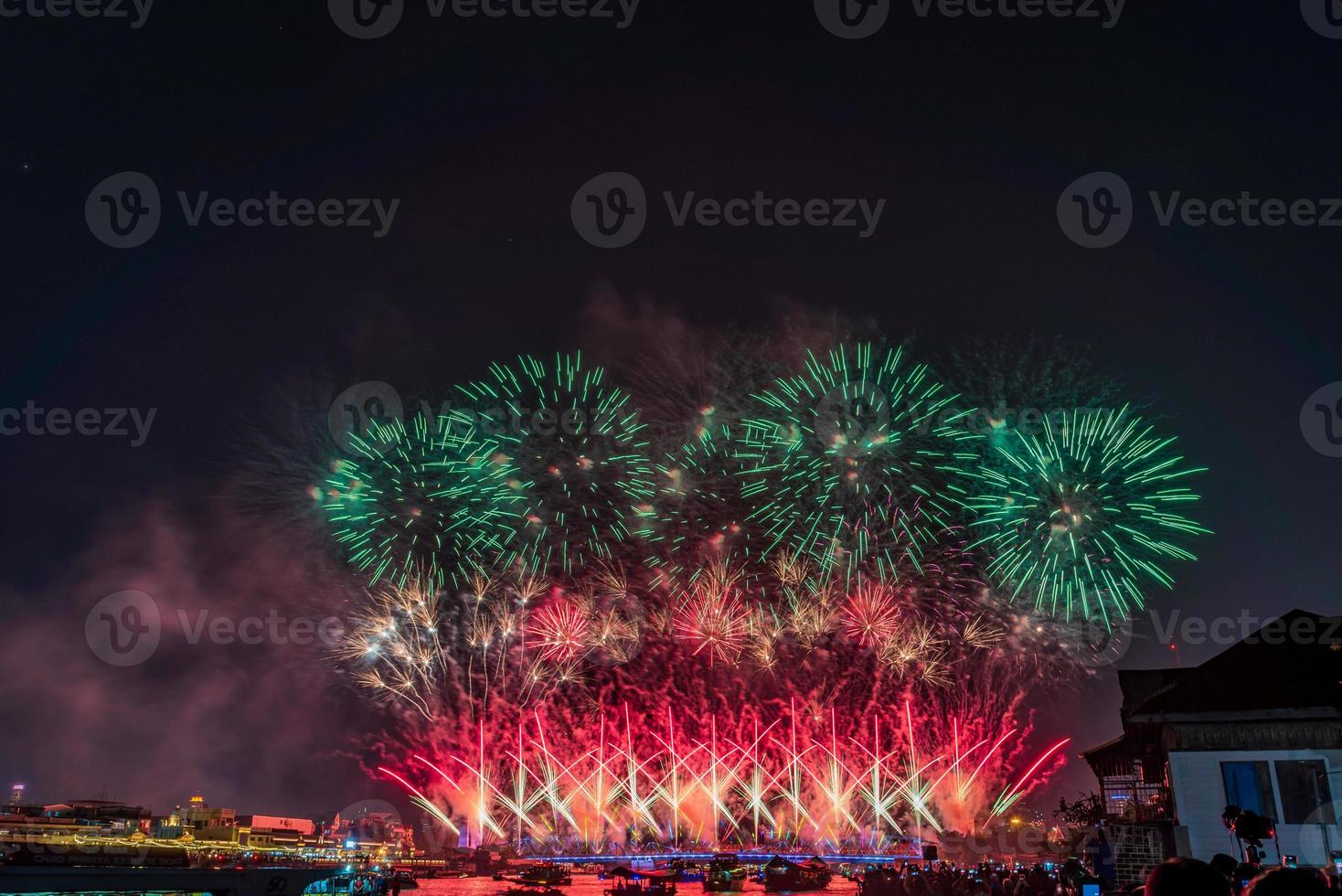 Colorful fireworks from Vijit Chao Phraya on Buddhayodfa Chulalok Maharat Bridge, Bangkok, Thailand. photo
