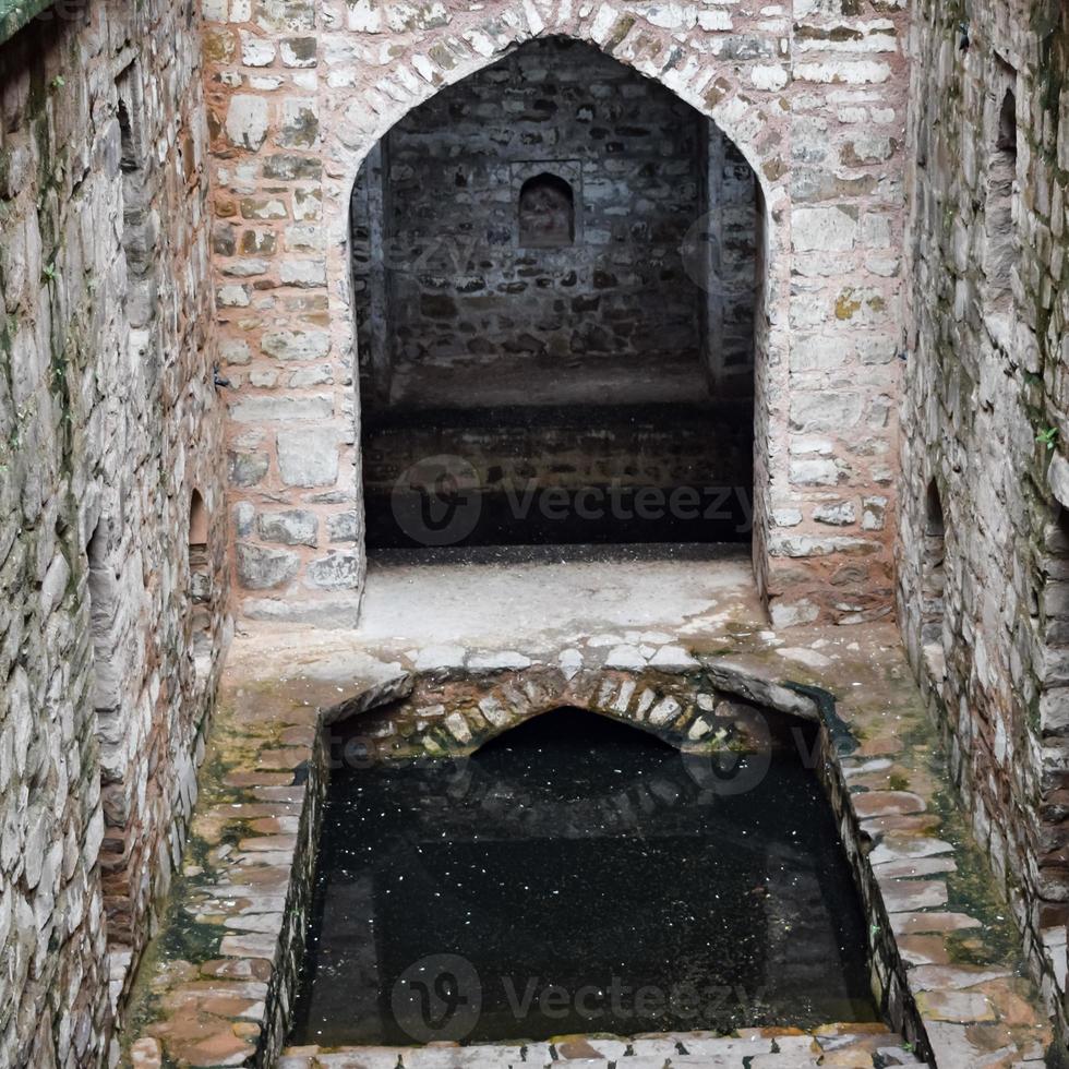 Agrasen Ki Baoli Step Well situated in the middle of Connaught placed New Delhi India, Old Ancient archaeology Construction photo