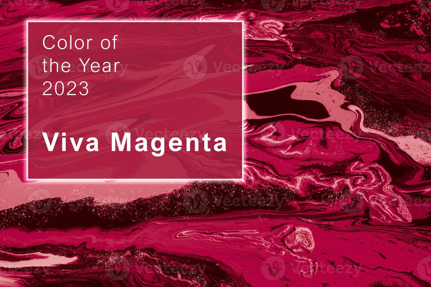 Viva Magenta - color of the year 2023. Trendy color sample. Beautiful toned surface with marble effect. photo