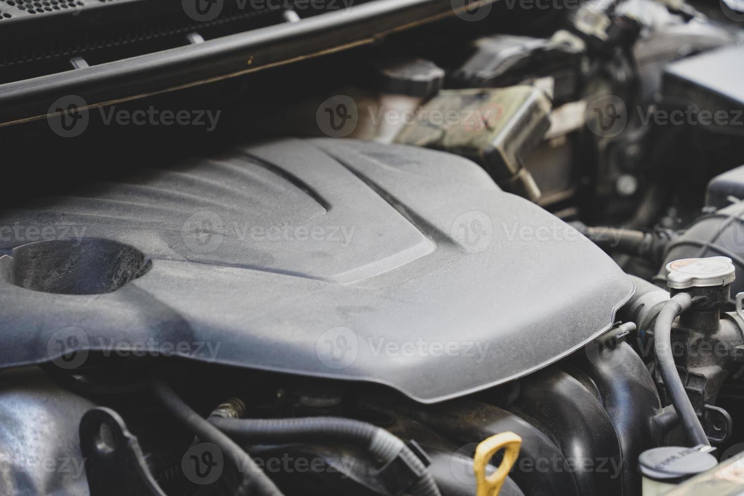 Picture of car parts and bumper in front of car photo
