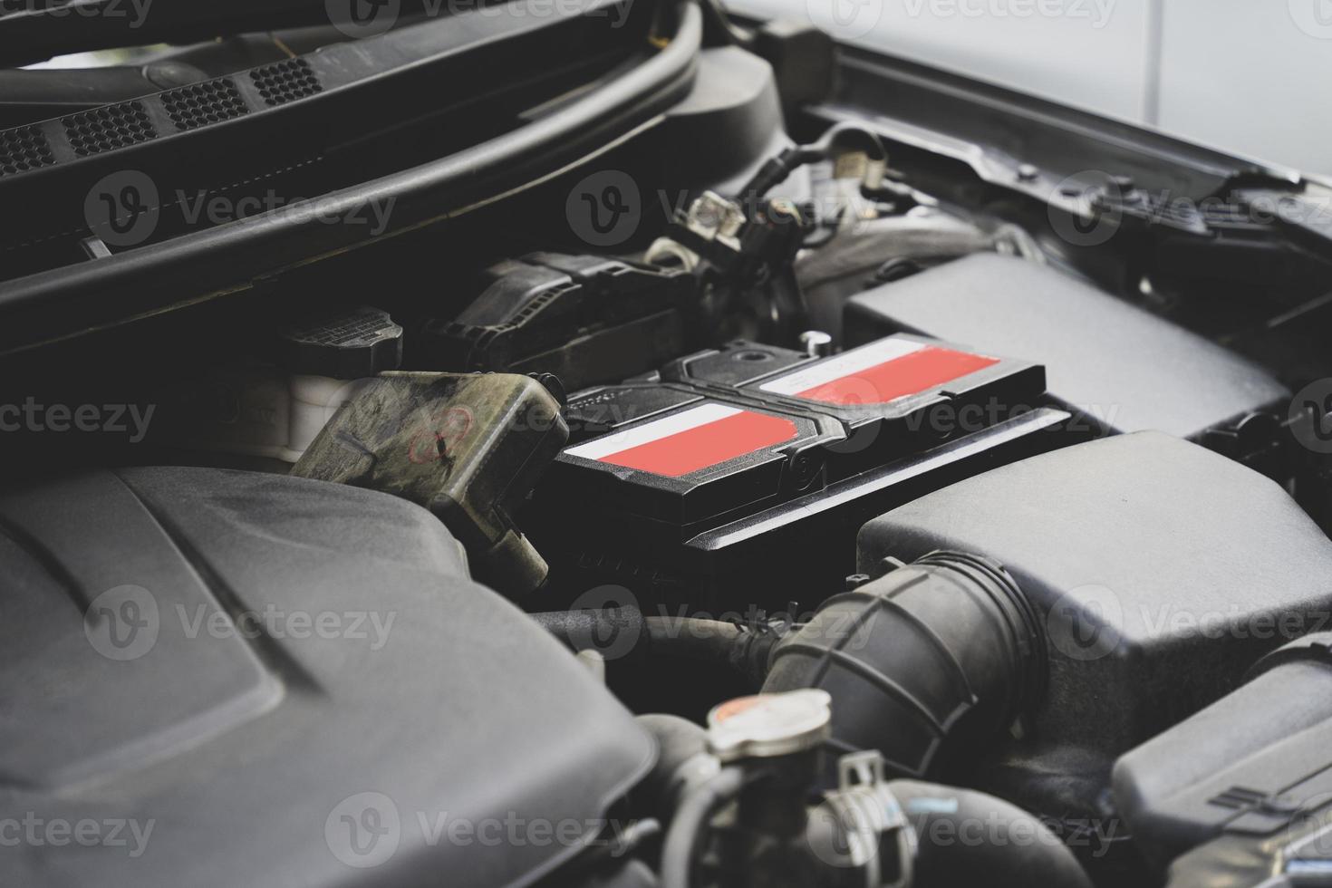 Picture of car parts and bumper in front of car photo