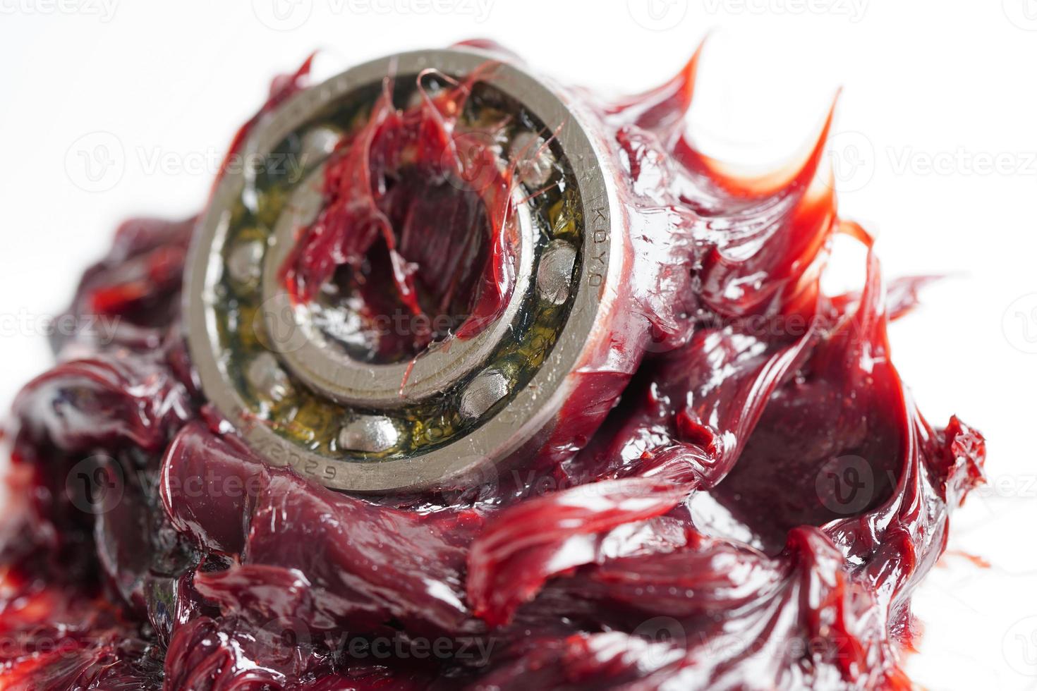 Grease and ball bearing, red excellent water resistance synthetic lithium complex grease for moving path and machinery lubrication for automotive and industrial. photo