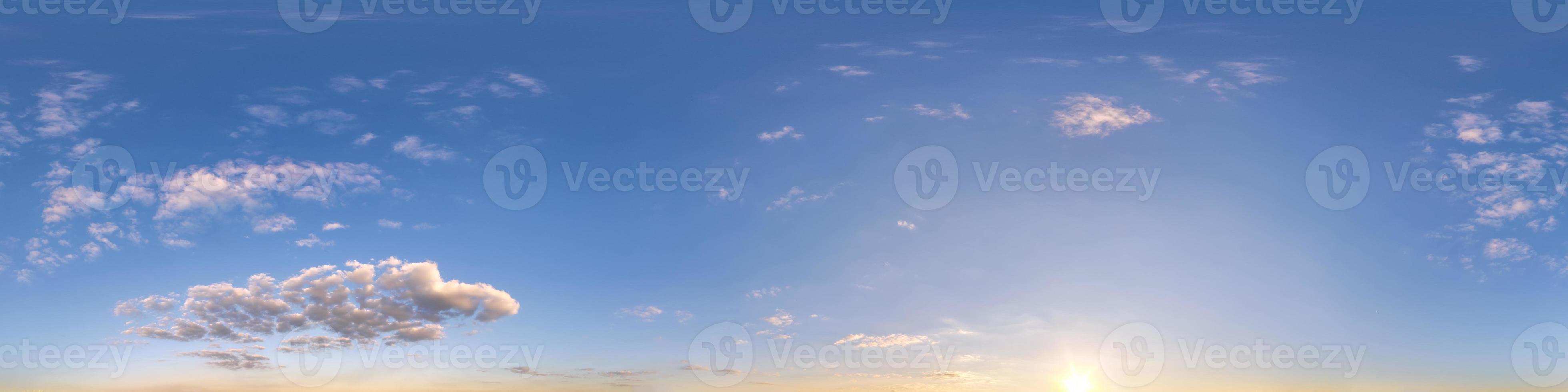 blue sunset sky with clouds as seamless hdri 360 panorama view with zenith in spherical equirectangular format for use in 3d graphics or game development as sky dome or edit drone shot photo