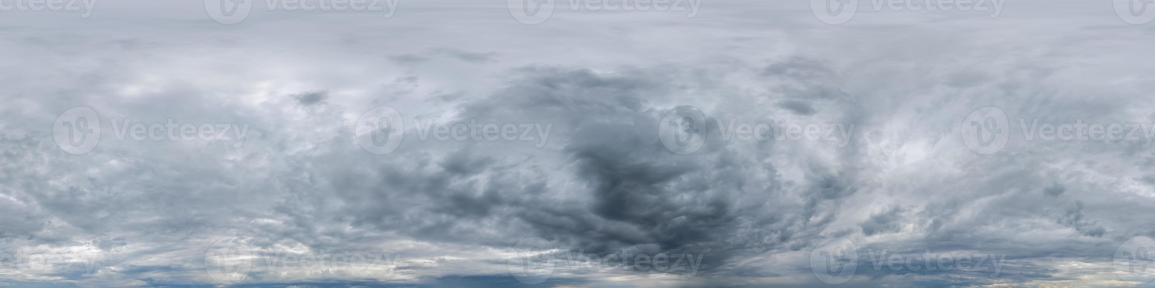 dark sky with storm clouds before rain as seamless hdri 360 panorama view with zenith in spherical equirectangular format for use in 3d graphics or game development as sky dome or edit drone shot photo